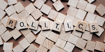 Politics written in wooden block letters